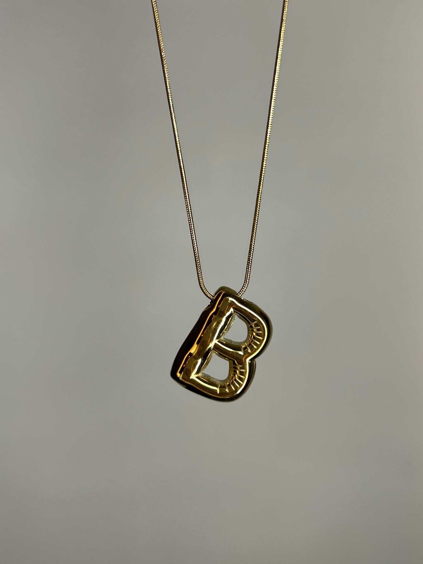 Bubble Initial necklace (gold plated)