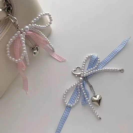 Pink bow bag charm