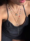 Ariana’s necklace stack