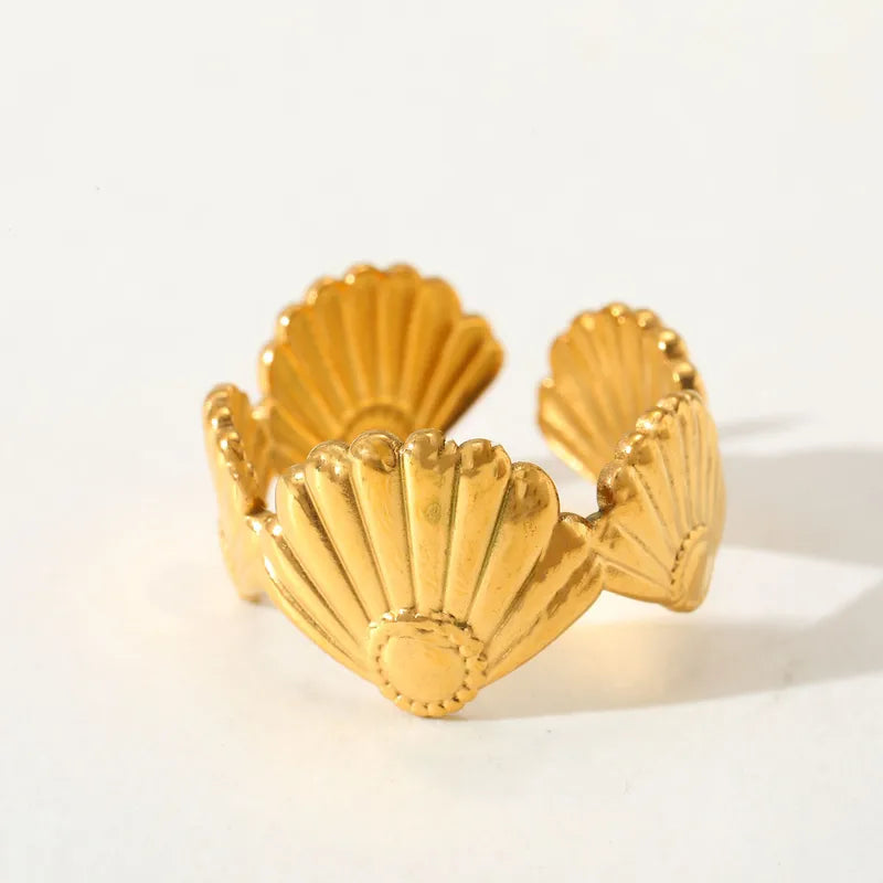 gold shell ring, starfish ring, beach jewelry, ocean inspired ring, adjustable gold ring, shell statement ring, women’s fashion ring, coastal jewelry, trendy gold ring, vacation jewelry, summer accessories, boho ring, stainless steel ring, sea life jewelry, luxury adjustable ring